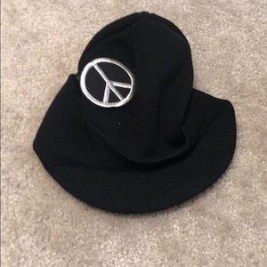 Peace sign hat and plain black hat...same style